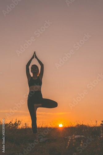 Silhouette of Woman Doing Yoga at Sunset on Nature
