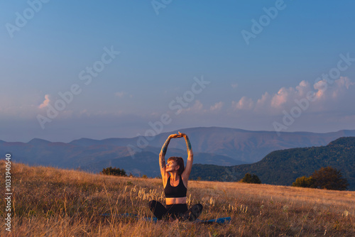 Obraz na płótnie Woman Stretching Hands on Yoga Mat Outdoors w salonie