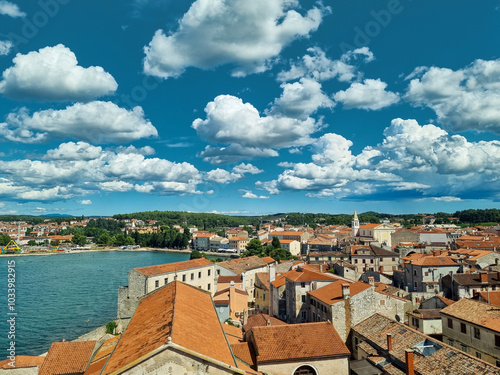 Aerial view of a beautiful village in Italy with colored houses and a medieval castle. photo