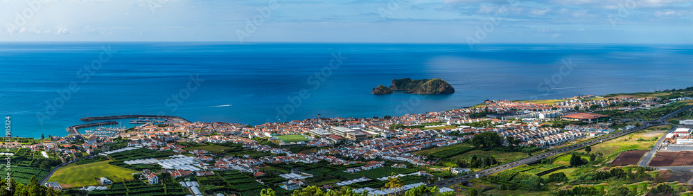 A panorama view from the Chapel of Our Lady of Peace across Ribeira Seca on the island of San Miguel in the Azores in summertime A panorama view from the Chapel of Our Lady of Peace across Ribeira Seca on the island of San Miguel in the Azores in summertime