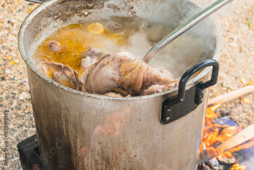 Tradicional Sancocho de Olla Colombiano, sopa de pollo en leña tradicional colombiano photo