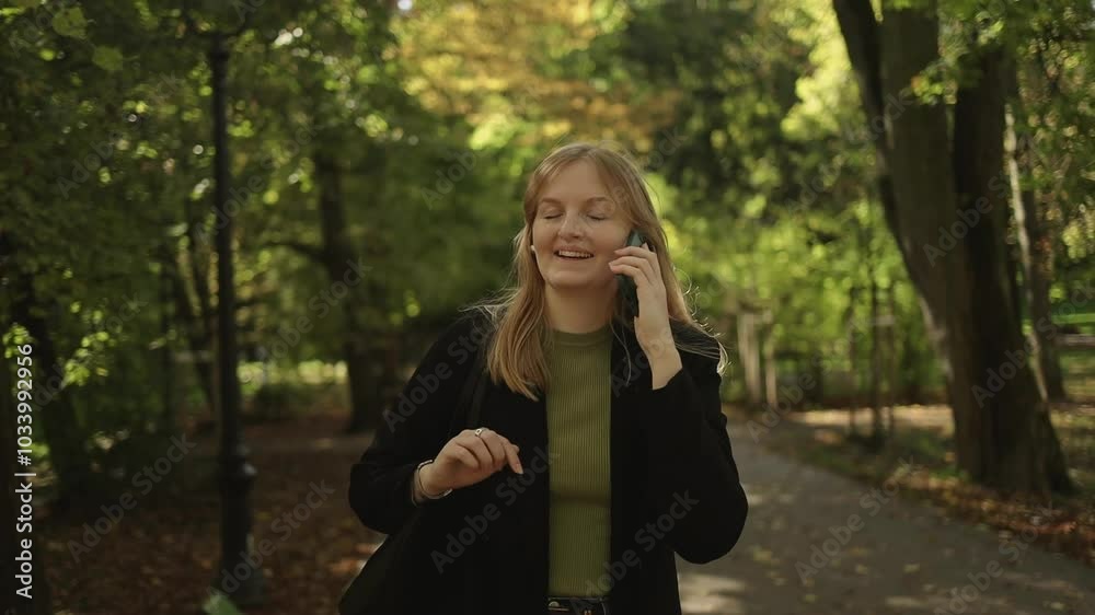 Business woman talking on mobile phone outdoors, professional woman in suit walking on old city street checks her smartphone. High quality FullHD footage Business woman talking on mobile phone outdoors, professional woman in suit walking on old city street checks her smartphone. High quality FullHD footage