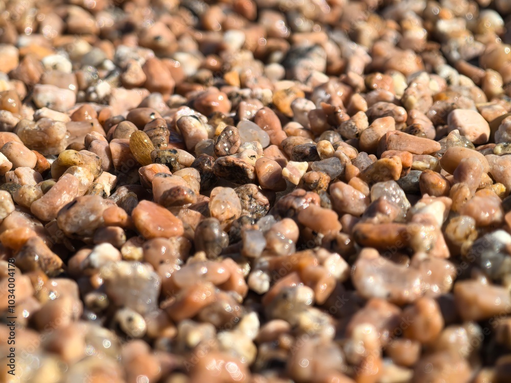 Detailed Close-up of Beach Sand Texture, Highlighting Intricate Shapes, Rich Color Variations, Perfect for Graphic Design Projects and Artistic Creations. Detailed Close-up of Beach Sand Texture, Highlighting Intricate Shapes, Rich Color Variations, Perfect for Graphic Design Projects and Artistic Creations.