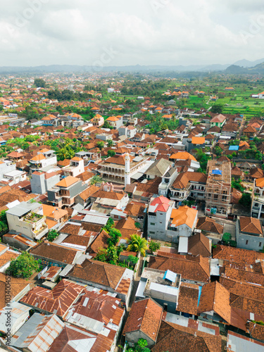 Aerial drone view of Muslim Balinese settlements scenery at Gelgel Village in Klungkung, Bali, Indonesia. photo