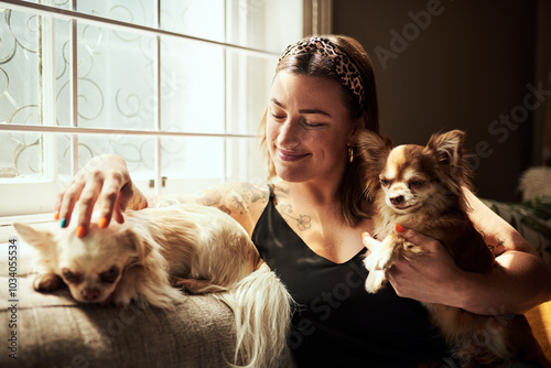 Photography Woman, relax and happy with dogs on sofa for cuddle, bonding with animals or smile in home