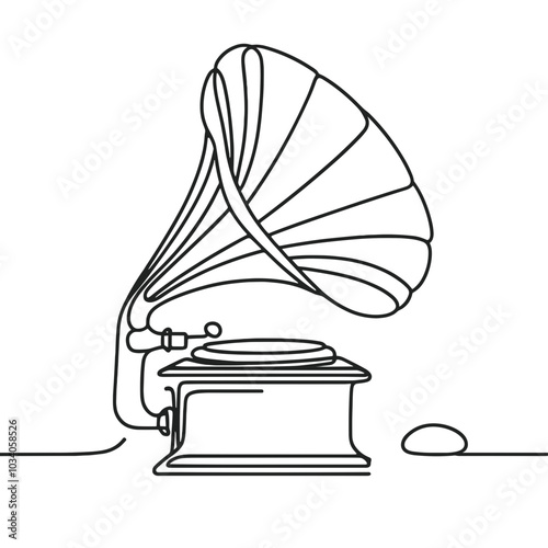 A record player with a stylus on the record. The stylus is black and the record is white