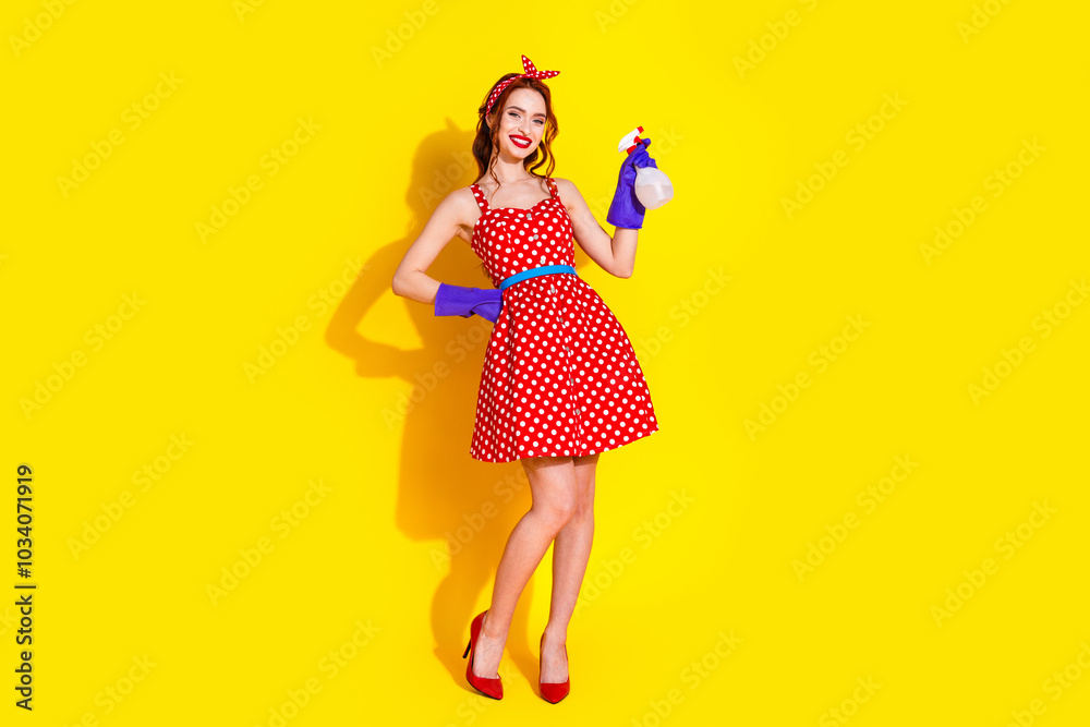 Photo of cute lovely adorable lady wear red dress hold bottle water isolated on yellow color background Photo of cute lovely adorable lady wear red dress hold bottle water isolated on yellow color background
