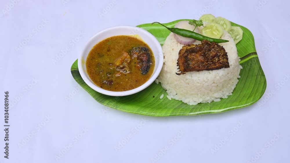 Delicious Indian fish curry with rice. Traditional Asian fish curry dish. Asian food and meal. It is liked all over India. Indian style fish curry served in plate with rice. Indian food. Delicious Indian fish curry with rice. Traditional Asian fish curry dish. Asian food and meal. It is liked all over India. Indian style fish curry served in plate with rice. Indian food.