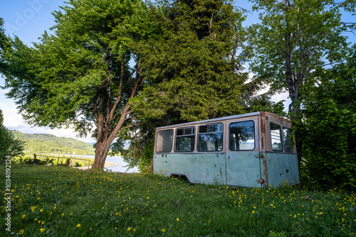 abandoned bus in a clearing for overnight stay
