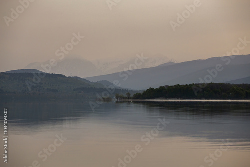 sunrise on a mountain lake, cloudy weather, Shaori Reservoir Georgia