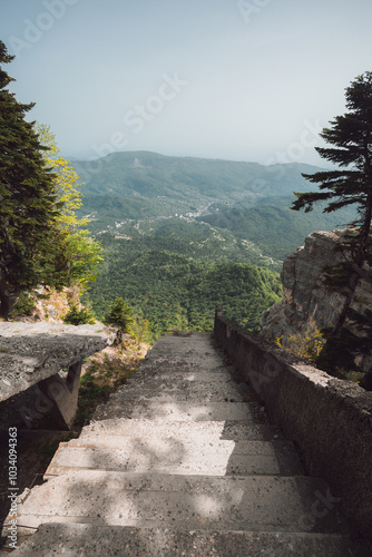 concrete stairs leading to a steep cliff photo