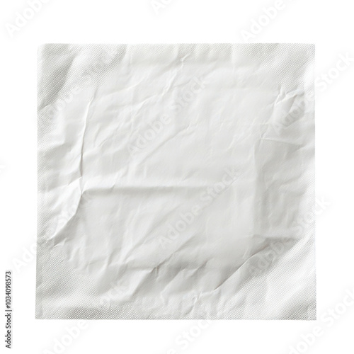Crumpled white napkin resting on a smooth surface