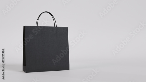 Black shopping bag on a minimalist white background. An elegant and timeless design, perfect for creating visual compositions for luxury brands and fashion campaigns.