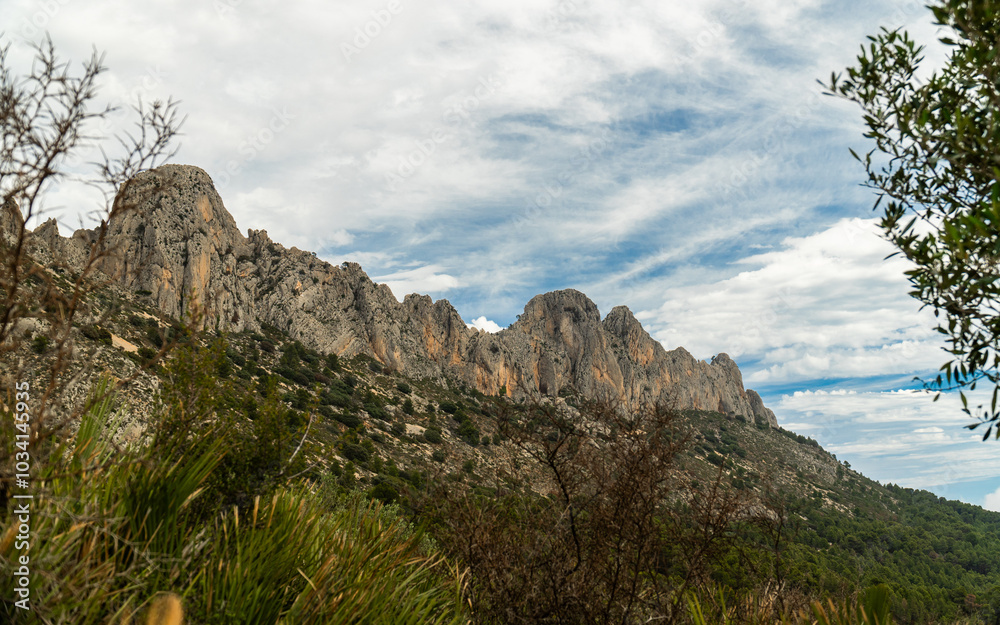 Panoramic view of a rocky mountain with some peaks, in Bernia, Alicante (Spain) Panoramic view of a rocky mountain with some peaks, in Bernia, Alicante (Spain)