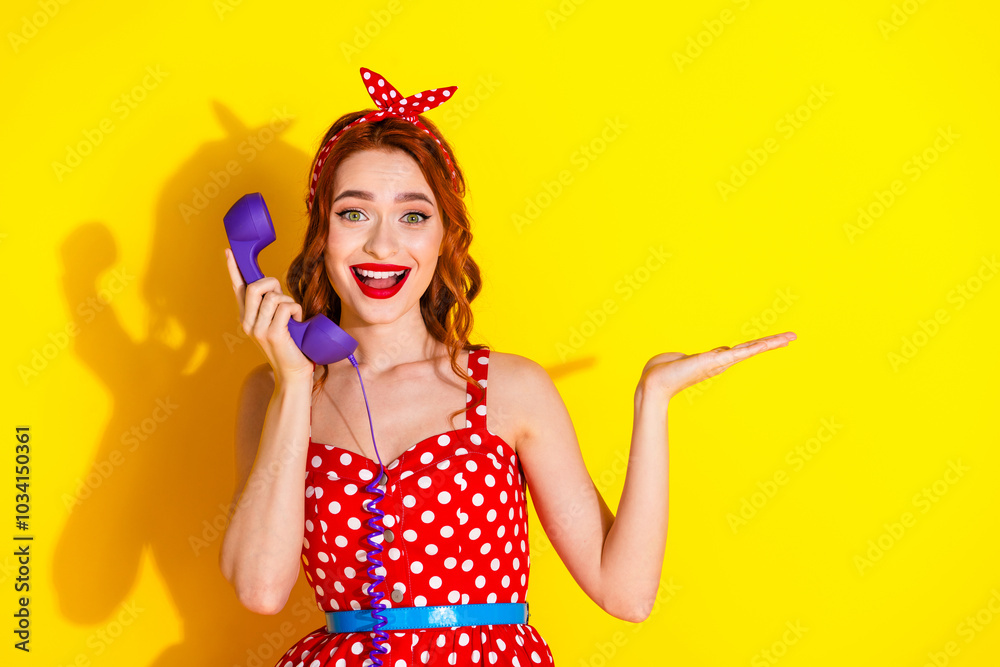 Photo of cheerful lovely glad lady wear red trendy dress speak phone empty space isolated on yellow color background Photo of cheerful lovely glad lady wear red trendy dress speak phone empty space isolated on yellow color background