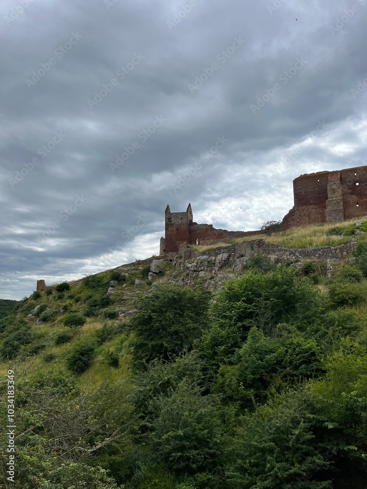 ruins of an old castle in the mountains ruins of an old castle in the mountains
