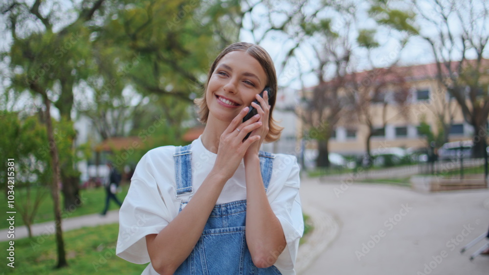 Trendy girl calling mobile phone enjoying urban walk closeup. Happy woman finish Trendy girl calling mobile phone enjoying urban walk closeup. Happy woman finish