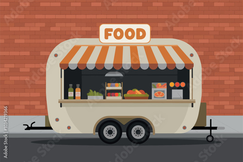 Food trailer on the street, brick wall in the background.
