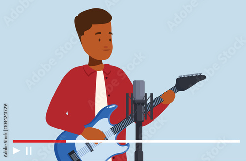 Male musician playing electric guitar and recording music for his video blog