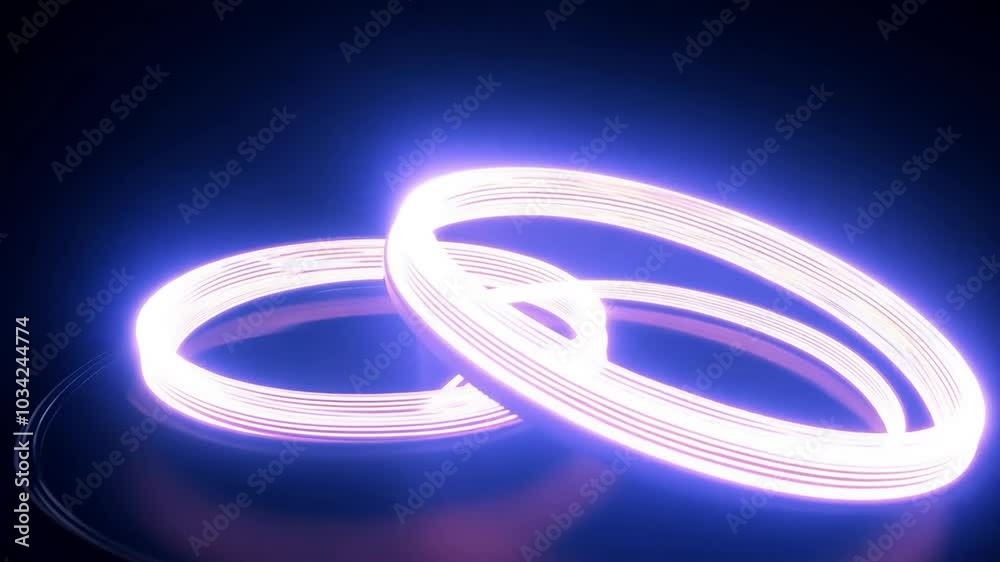 Two glowing rings intertwine gracefully against a black background, creating a mesmerizing display of light and energy Two glowing rings intertwine gracefully against a black background, creating a mesmerizing display of light and energy