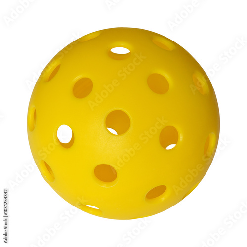 Obraz na płótnie The pickleball ball is hard and perforated, bright yellow. w salonie