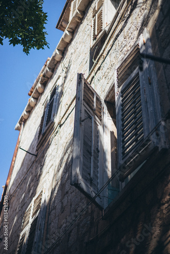 window shutters in old stone house, Old Town, Dubrovnik, Croatia