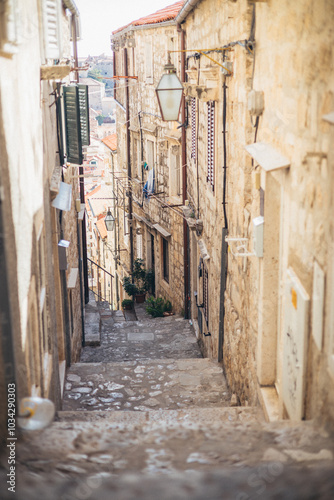 looking down at narrow street with steps in Old Town, Dubrovnik, Croatia