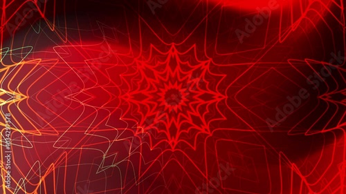 Abstract red, yellow, and green kaleidoscope pattern background.