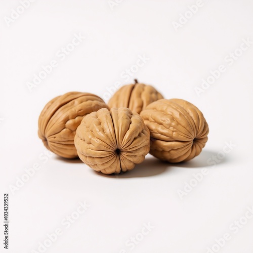 Isolated walnuts on white backdrop photo