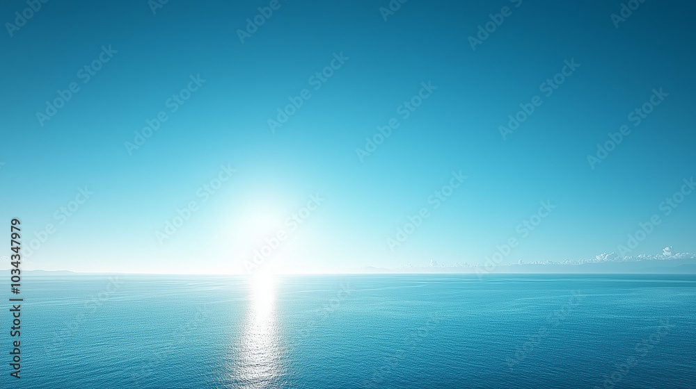 Obraz premium Radiant Sunlight Reflecting on Calm Ocean Surface
