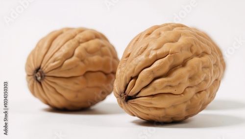 Isolated walnuts on white backdrop photo