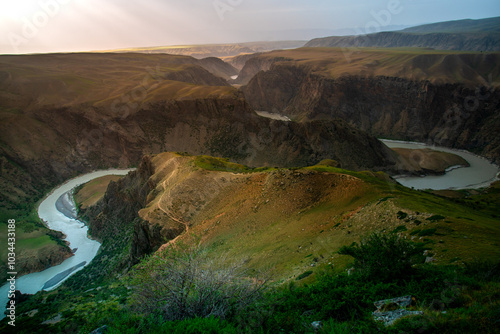 Kuokesu Grand Canyon, one of scenic areas in Kalajun Grassland which the landscape features are high gorges, flat lakes, snow-capped mountains, Tekes County, Ili Kazakh Autonomous Prefecture, Xinjiang photo