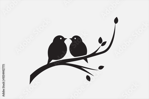 A black silhouette of two small birds sitting on a thin.