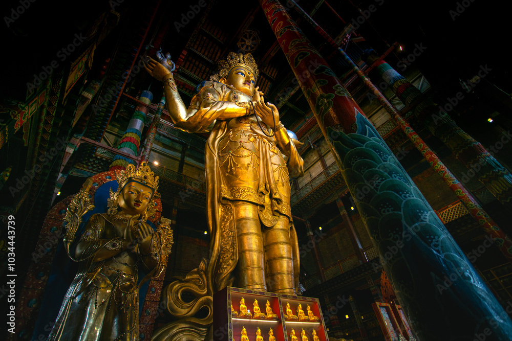 Statue of Avalokitesvara, a 26-metre (85 ft) statue made of gilded bronze and precious stones in Gandantegchinlen Monastery, Ulaanbaatar, Mongolia