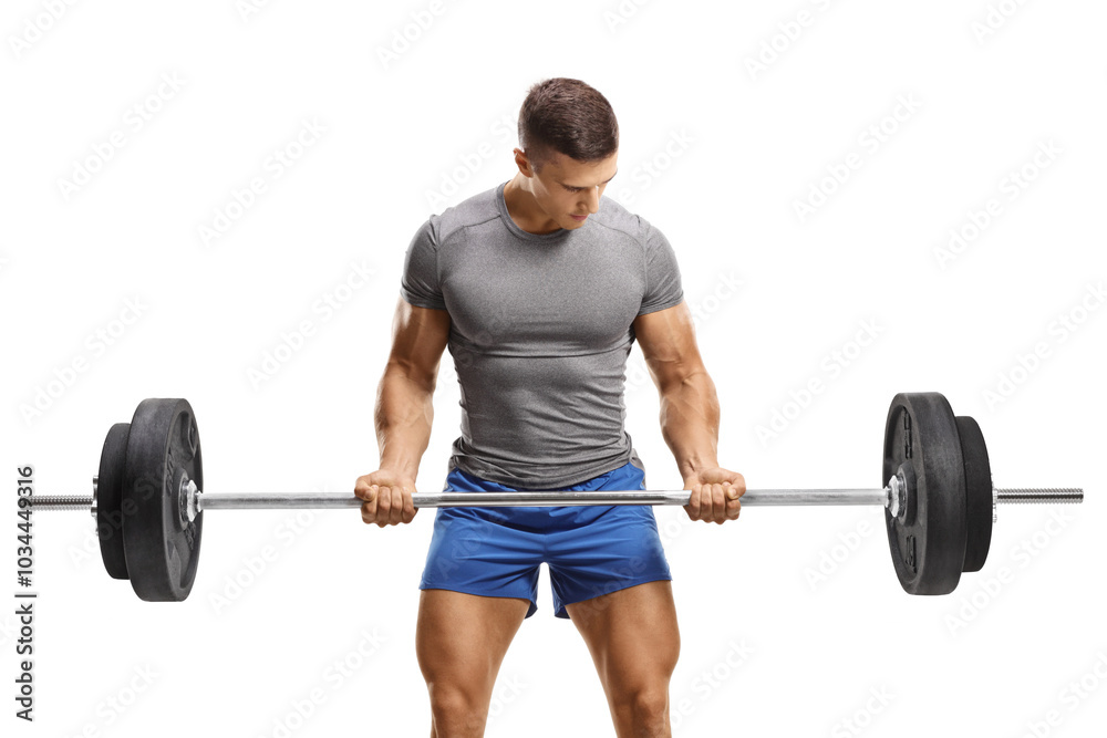 Muscular young man in sportswear lifting weights Muscular young man in sportswear lifting weights