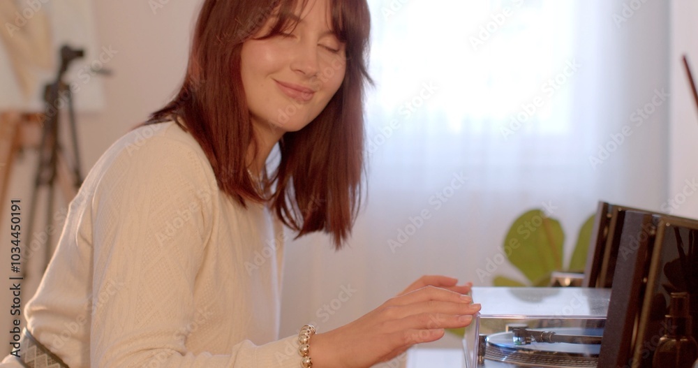 A woman is sitting gracefully at a piano, her eyes gently closed and a warm smile illuminating her face as she plays beautifully A woman is sitting gracefully at a piano, her eyes gently closed and a warm smile illuminating her face as she plays beautifully