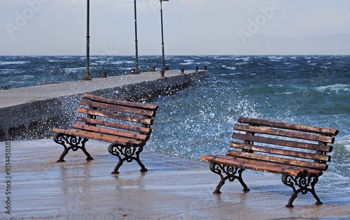 Two benches and storming waters