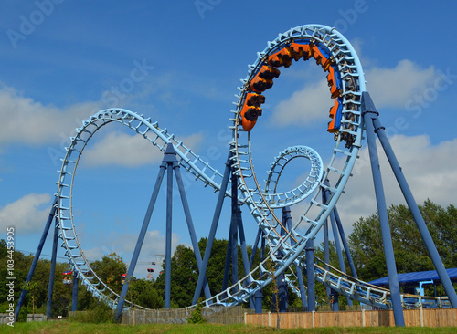 Roller coaster  ride filled  with thrill seekers 