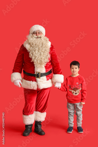 Santa Claus and cute little...