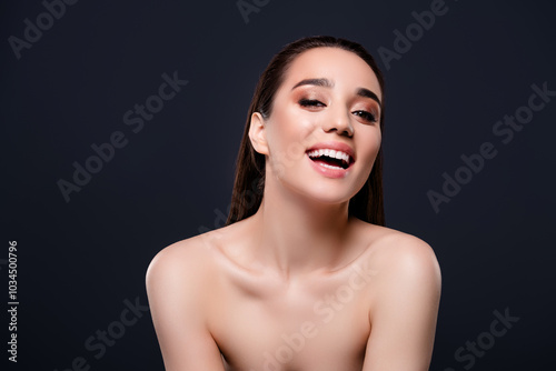 Photo of lovely cheerful lady naked shoulders good mood isolated on dark grey color background