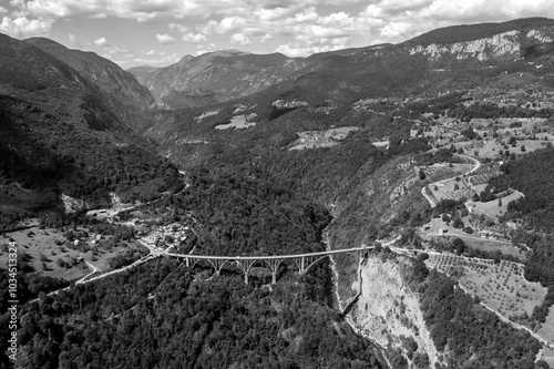 1940s concrete bridge with large arches and a picturesque view in Montenegro