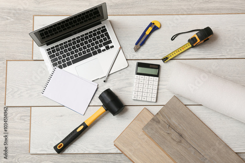 Tools, laptop, calculator a...