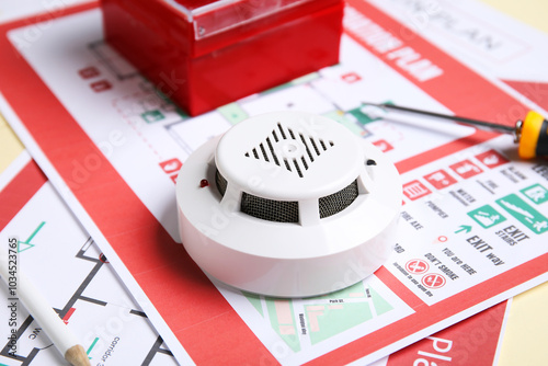Modern smoke detector on ev...