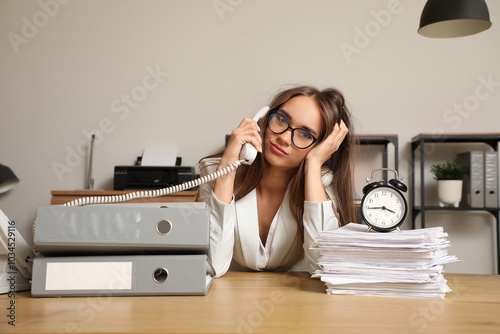 Stressed businesswoman talk...