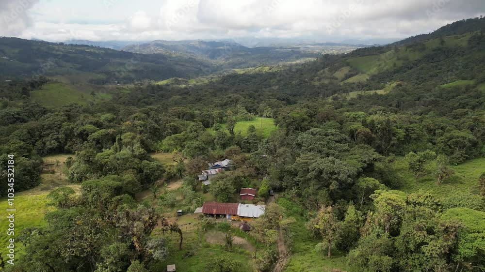 birds eye view of farm in mountains birds eye view of farm in mountains