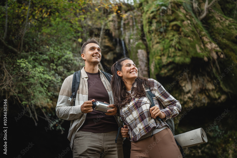 hiker couple backpackers explore forest and have fun together hiker couple backpackers explore forest and have fun together