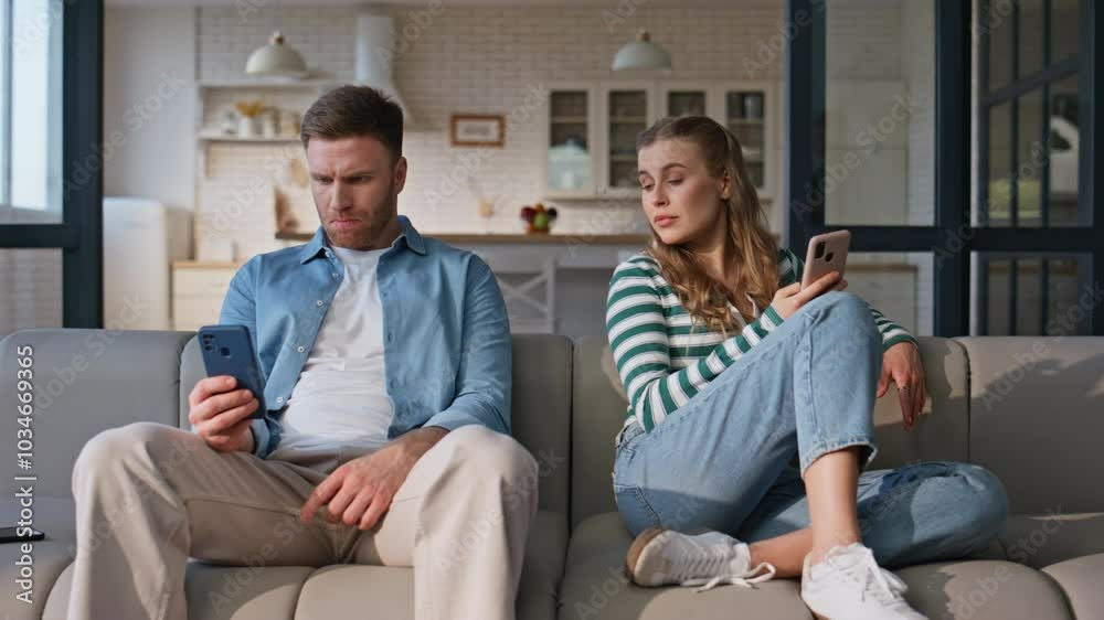 Internet addicted friends browsing smartphones domestic weekend. Offended couple Internet addicted friends browsing smartphones domestic weekend. Offended couple