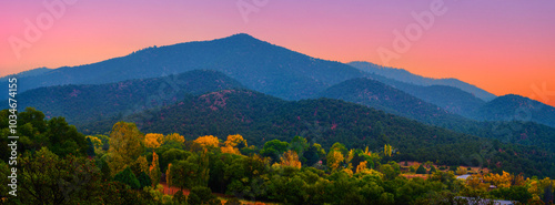 Santa Fe New Mexico Skyline: The beautiful autumn sunset cityscape surrounded by the Sangre de Cristo Mountains in the Southwestern USA