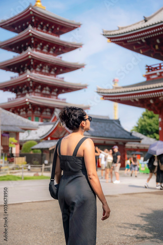 Photography Unrecognizable Latina woman wearing a black outfit and sunglasses in black outfi