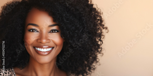 Beautiful black woman on neutral beige background, skincare.	